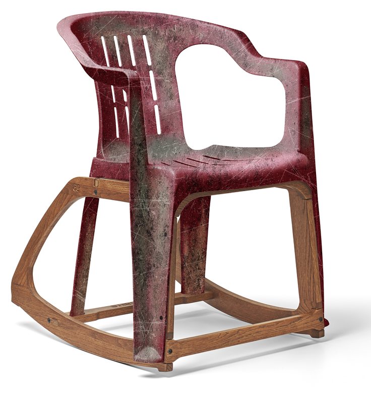 PRELOVED: a scratched, weathered burgundy monobloc on oak rockers